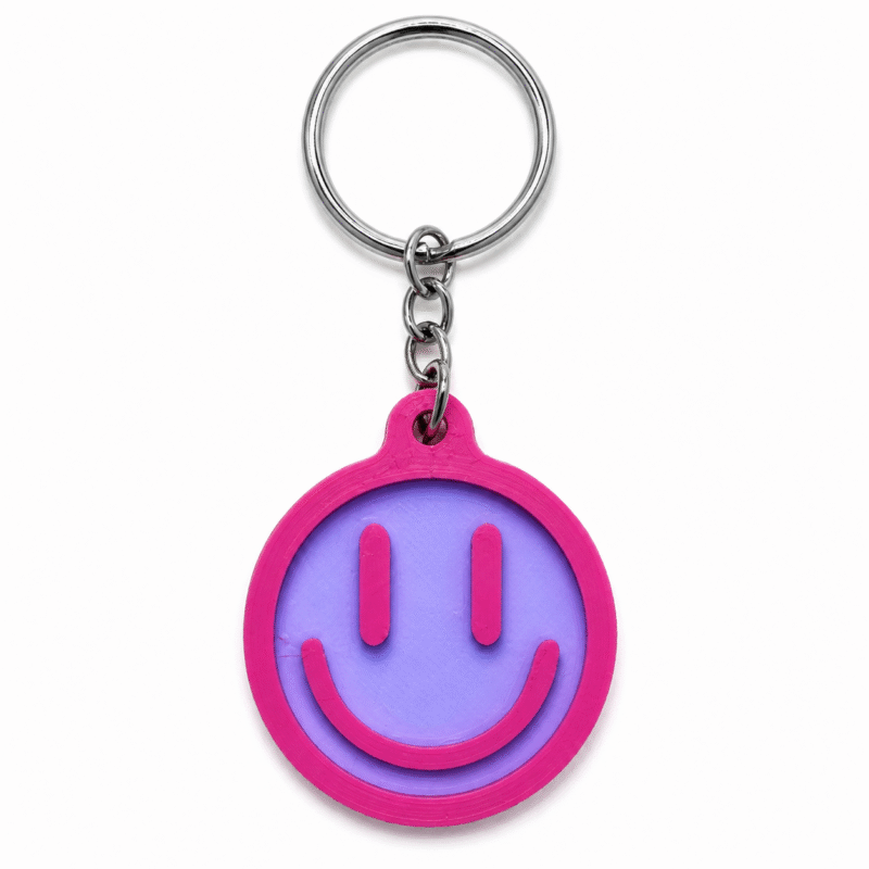 3D geprinte smiley sleutelhanger in roze en paars